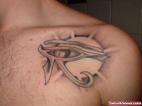 Grey Ink Sun And Egyptian Eye Tattoo On Collarbone