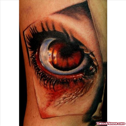 Brown Eye Tattoo On Sleeve