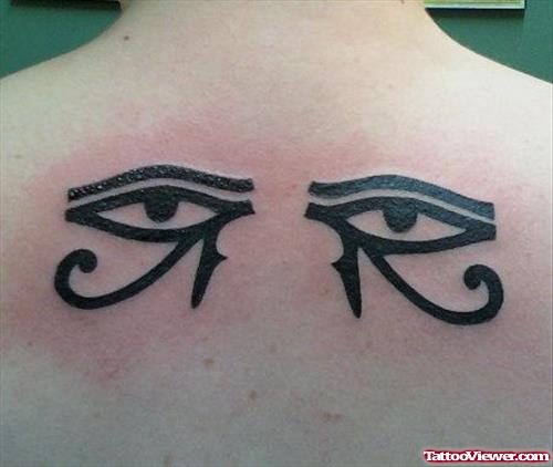 Black Ink Egyptian Eye Tattoos On Upperback