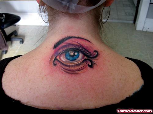 Realistic colored Eye Tattoo On Upperback