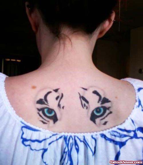Tiger Eyes Tattoos On Girl Upperback