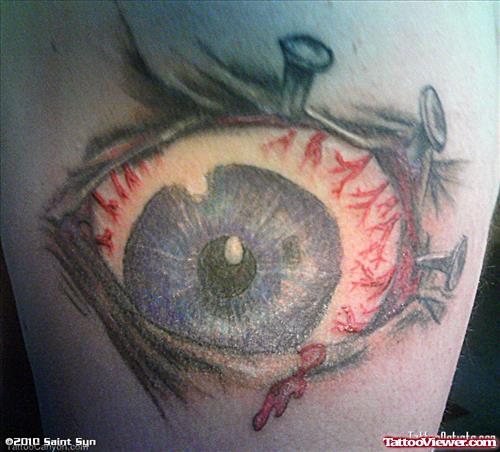 Ripped Skin Eye Tattoo