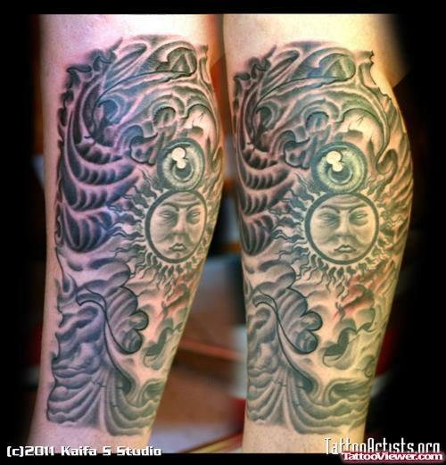Biomechanical And Sun With Eye Ball Tattoo On Leg