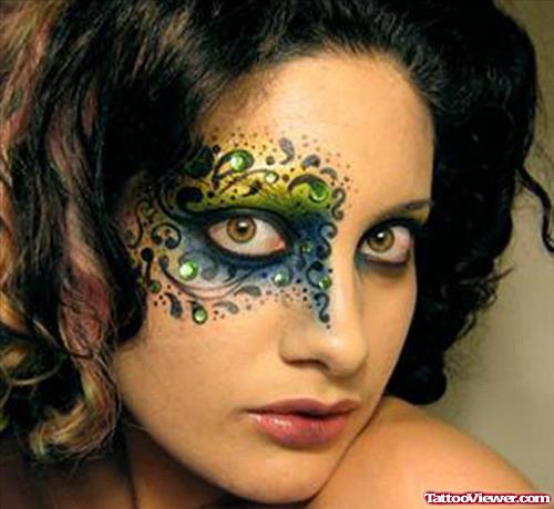 Swirl Colored Around Eye Tattoo