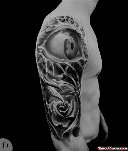Eye And Rose Tattoo On Man Right Sleeve