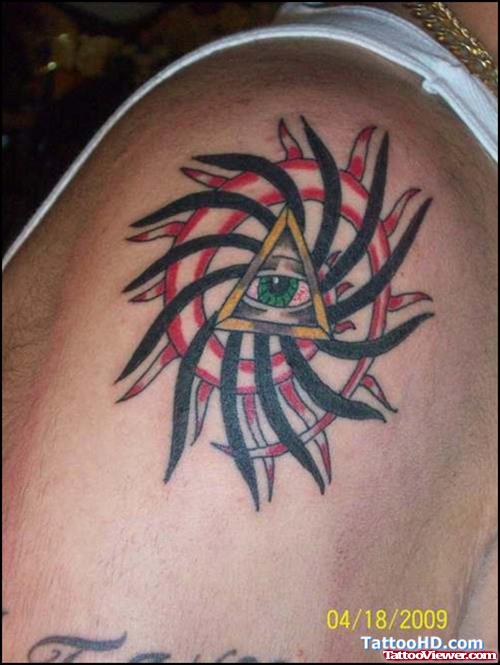 Tribal And Eye Of Sea Tattoo On Shoulder