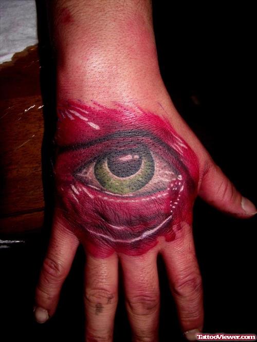 Red Eye Tattoo On Right Hand
