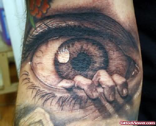 Large Eye And Fingers Tattoo Design
