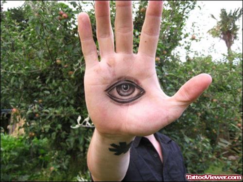 Grey Ink Eye Tattoo On Right Palm