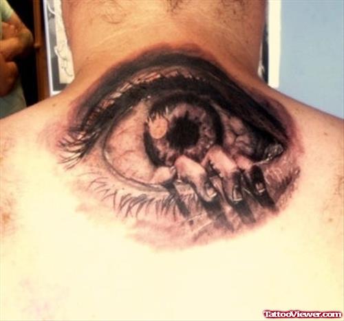Grey Ink 3D Eye Tattoo On Upperback
