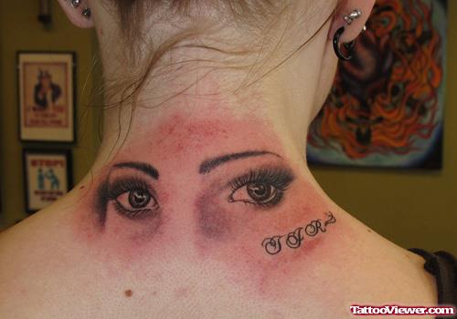 Amazing Grey Ink Eye Tattoos On Upperback