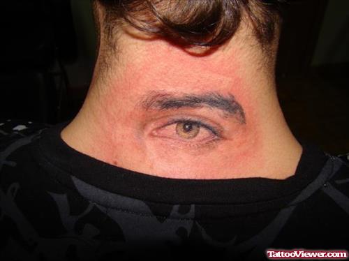 Grey Ink Eye Tattoo On Upperback