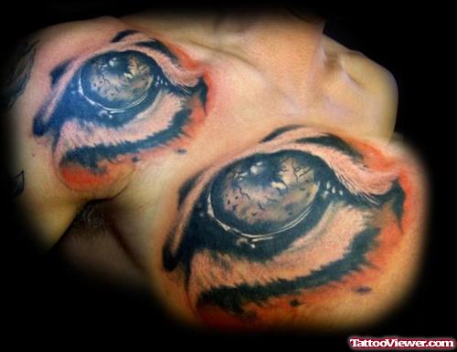 Colored Eye Tattoo On Man Right Shoulder