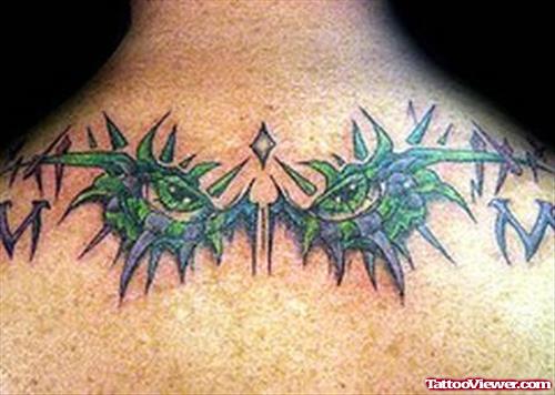 Green Tribal Eyes Tattoos On Back