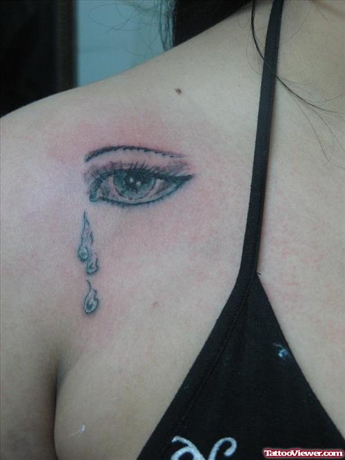 Eye With Tear Drops Tattoo On Shoulder