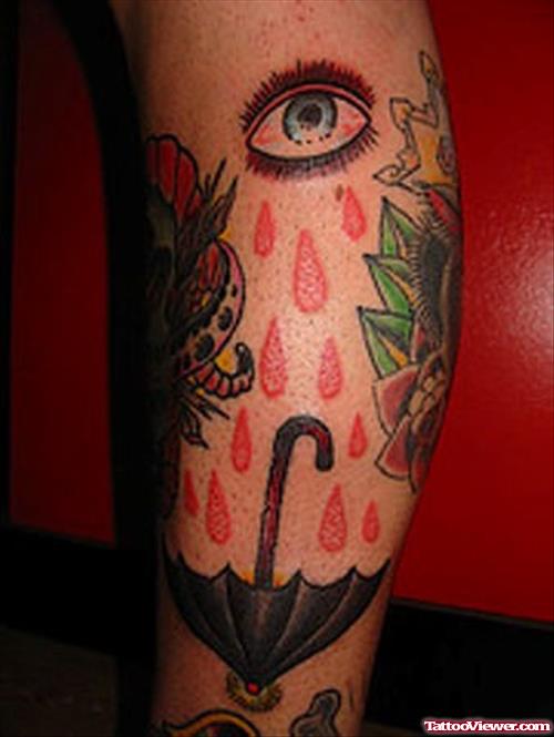 Colored Eye Tattoo On Leg