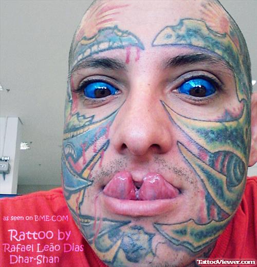 Blue Eyes Tattoo and Biomechanical Colored Face Tattoo