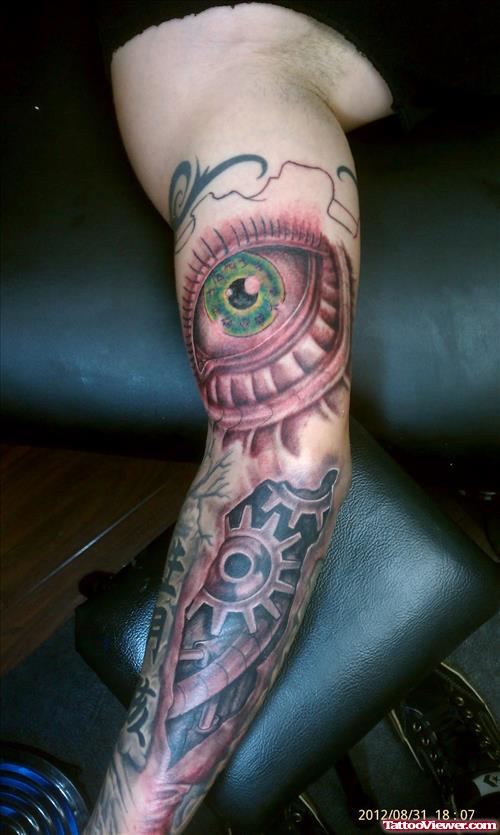 Biomechanical And Eye Tattoo On Sleeve