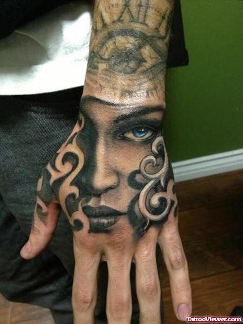 Grey Ink Girl Eye Tattoo On Left Hand