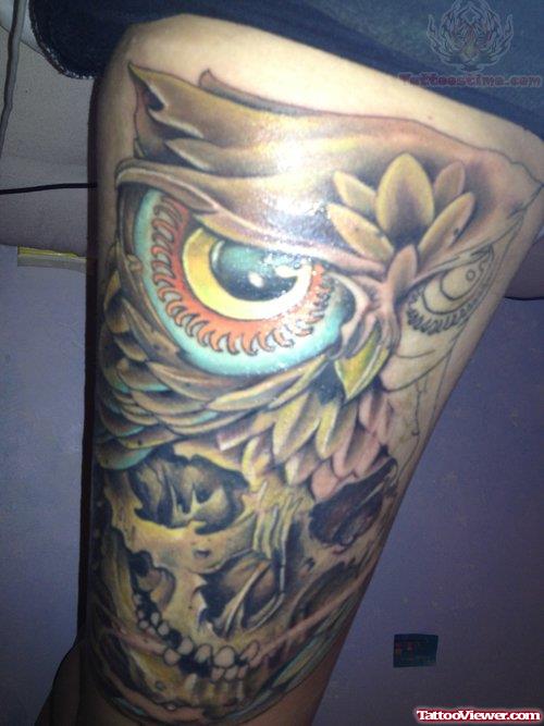 Flowers And Colored Eye Tattoo On Leg
