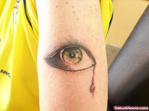 Bleeding Eye Tattoo On Bicep