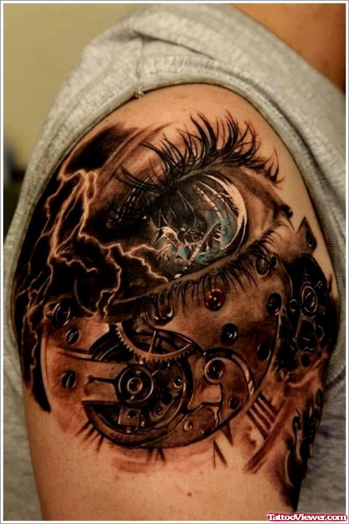 Biomechanical Eye Tattoo On Man Right Shoulder