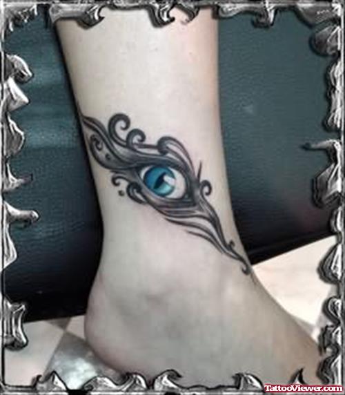 Tribal eye Tattoo On Ankle