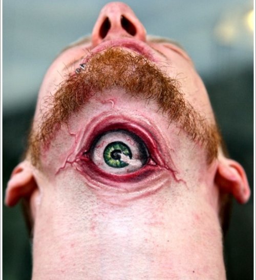 Eye Tattoo On Man Throat