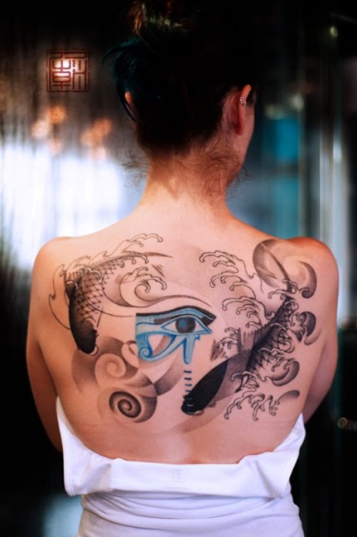 Egyptian Eye And Fish Tattoo On Upperback