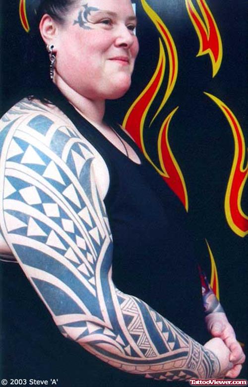 Tribal Sleeve Tattoo And Flying Birds Face Tattoo