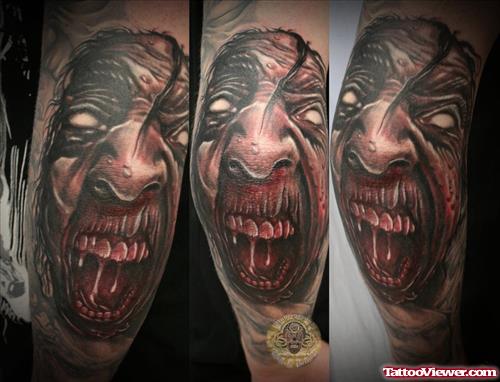 Scary Demon Face Tattoo On Elbow