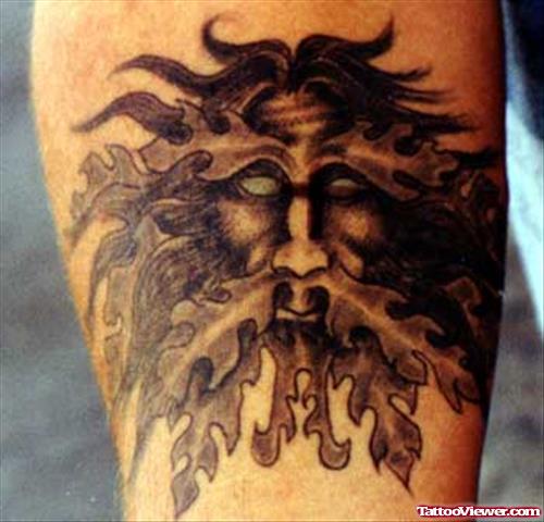 Grey Ink Viking Face Tattoo