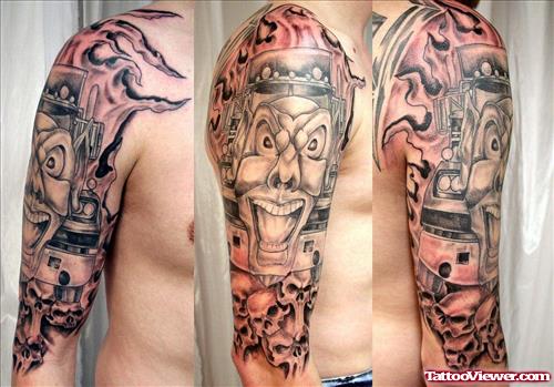 Grey Ink Skulls And Truck Mask Face Tattoo On Sleeve