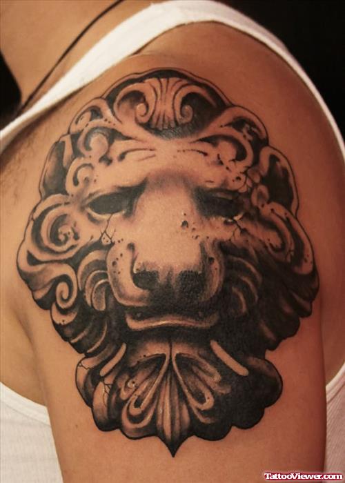 Grey Ink Lion Face Tattoo On Left Shoulder