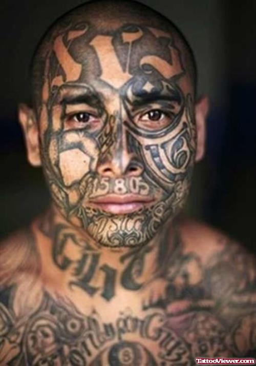 Good Black Ink Tribal Face Tattoo For Men