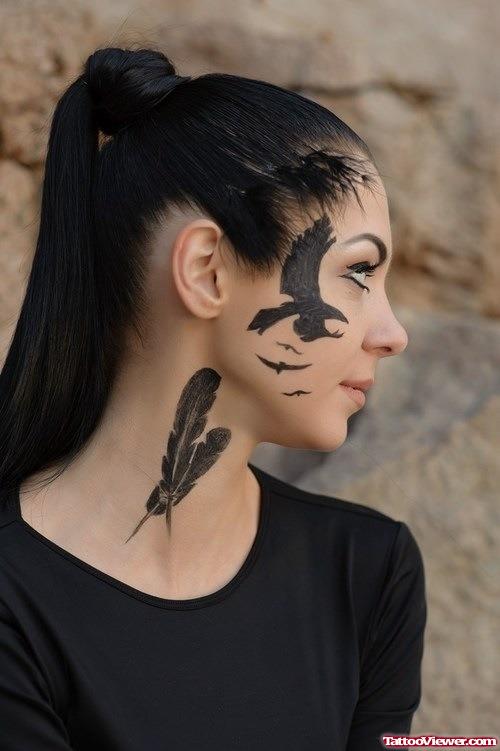 Feather And Flying Bird Face Tattoo