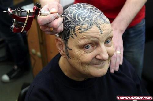 Tribal Tattoo On Head And Face Tattoo