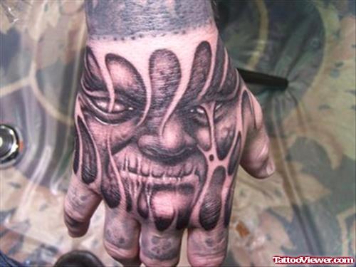 Scary Face Tattoo On Hand