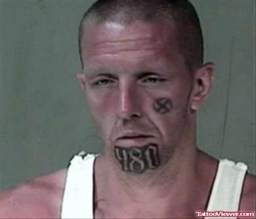 Number 480 Face Tattoo On Chin