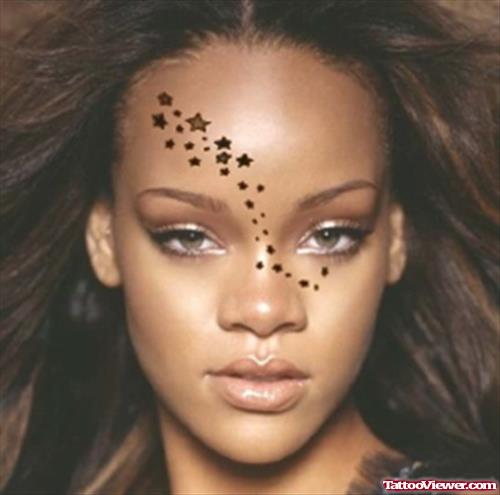 Rihanna Black Stars Face Tattoo