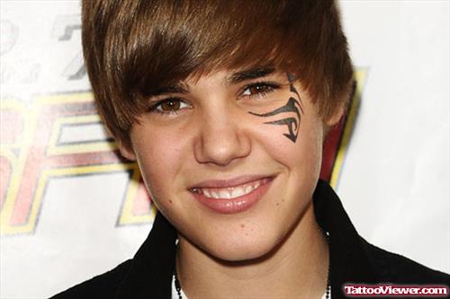 Justin Beiber Tribal Face Tattoo