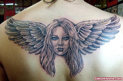 Angel Winged Face Tattoo On Back