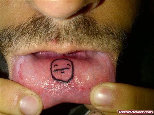 Poker Smoley Face Tattoo On Lip