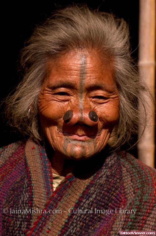 Old Woman With Face Tattoo