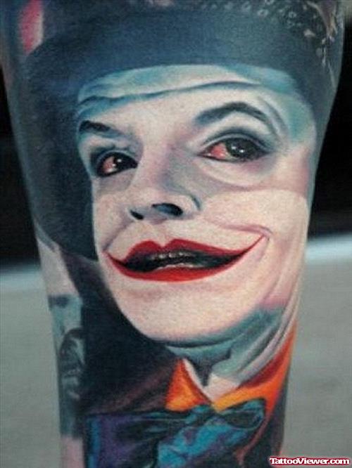 Colored Joker Face Tattoo On Sleeve