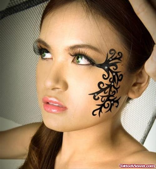 Swirl Face Tattoo For Girls
