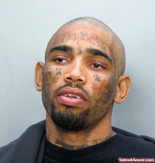Paw Prints And Gangsta Face Tattoo
