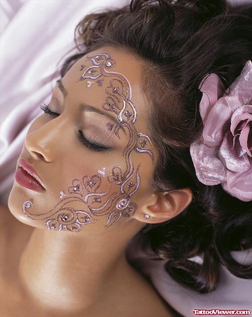 Swirl Face Tattoo Design FOr Girls