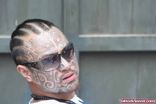 Inspiring Black Ink Tribal Face Tattoo For Men