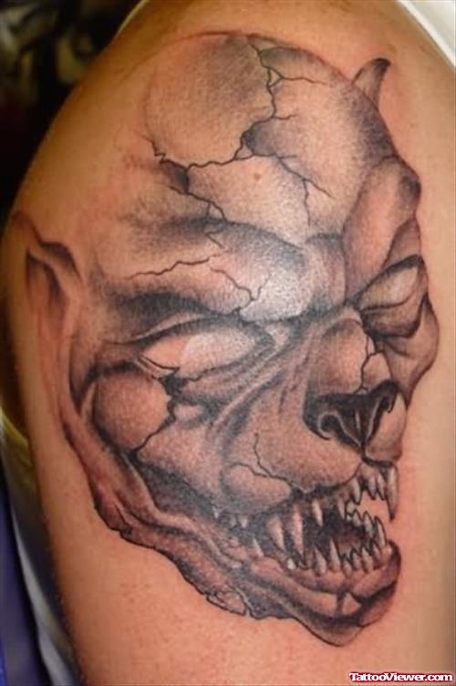 Grey Ink Gargoyle Face Tattoo